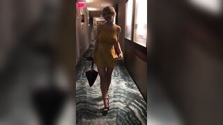 Busty Blonde Removes Dress In Hotel Hallway