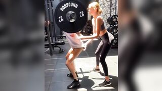 Kaia supporting cara during a workout